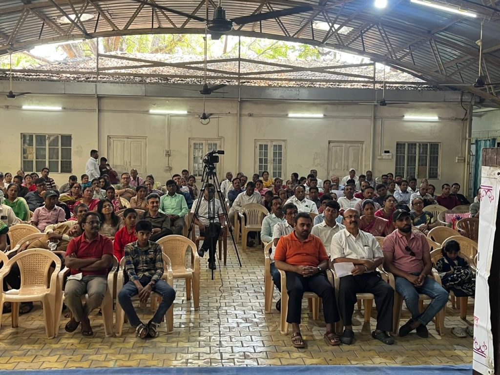 An audience seated in the hall at the matrimonial meet
