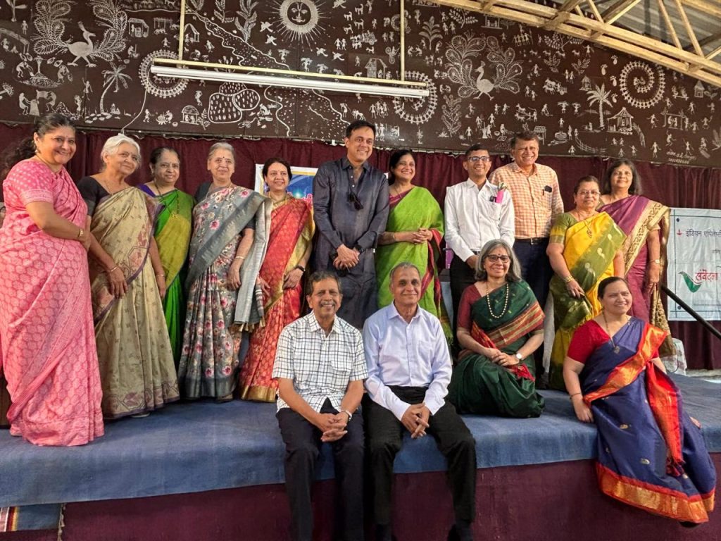 A group posing together on stage